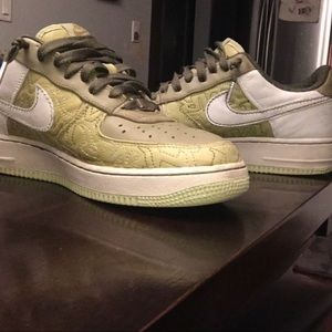 Green and white Nike Air Force 1